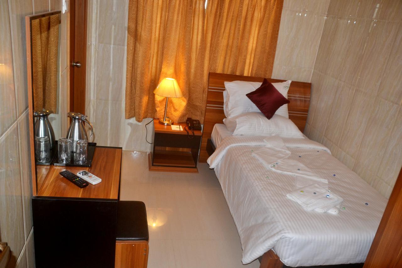 Peace Inn Chennai Zimmer foto